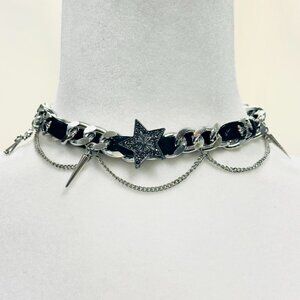 Y2K 2000s style black and silver chain choker with star spikes
